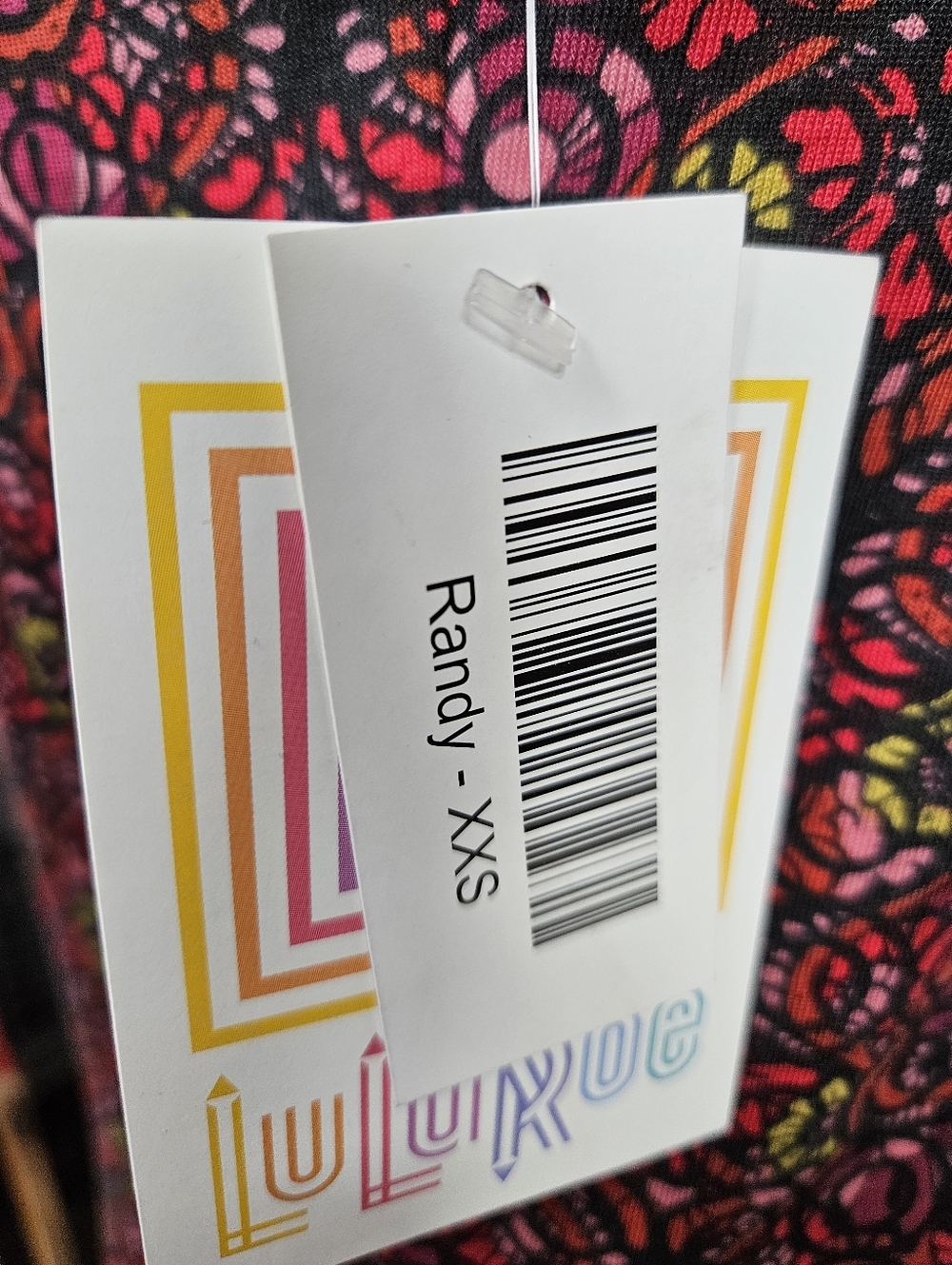 LuLaRoe XXS Randy T Black Top with Red, Pink & Yellow Floral Swirls - Picture 3 of 7